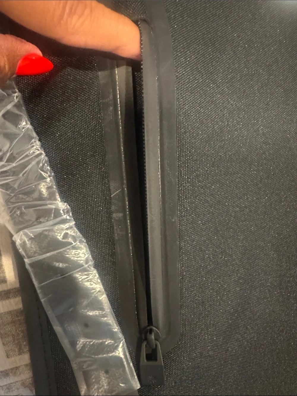 Rains NWT Black Matte Backpack, W/external Back phone pocket, fits a 15” laptop.